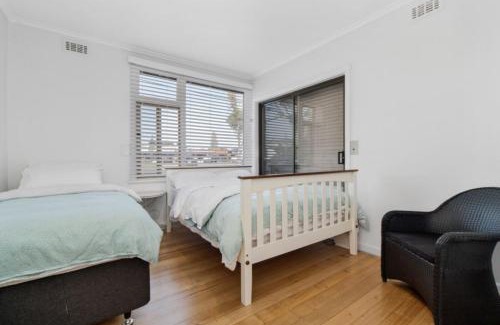 Rosebud House | Beachfront Retreat: Family-Friendly Getaway Awaits