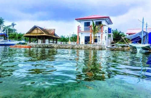 Olango Island Villa | Exclusive Jade's Beach Villa: Private Oceanfront Retreat