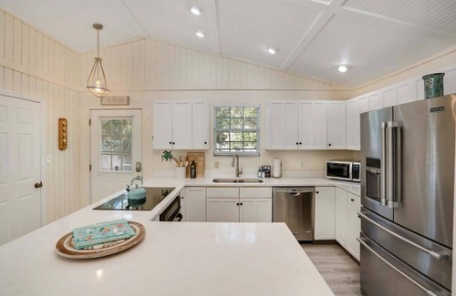 Palm Coast House | Serene Canal Fishing Cabin with Dock and Beach Gear