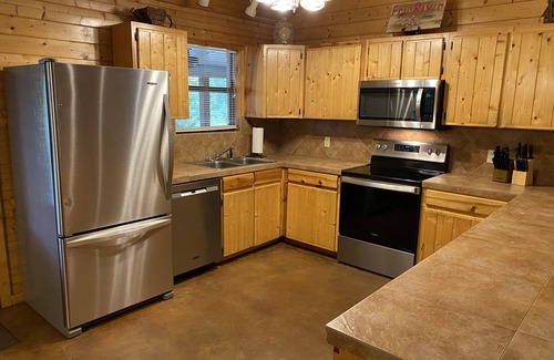 Leakey House | Guest Rated: 9.8 at On The Frio River with Family Amenities