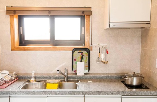 Seongsan House | Relax at On The Stone Pension: Oceanfront Pet-Friendly Retreat