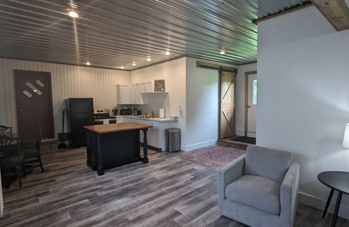 Island Falls Apartment | On the Trails, ATV & Snow. Plus on a18 hole golf course. Beautiful Views!