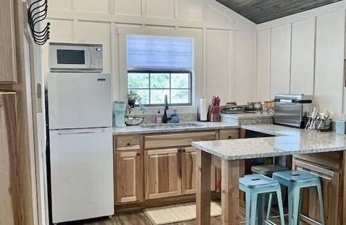 Leakey Cabin | Experience Riverfront Bliss in Pet-Friendly Tiny Cabin