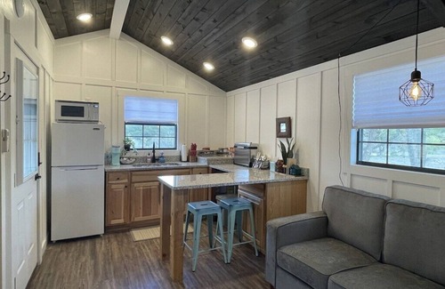 Leakey Cabin | Experience Riverfront Bliss in Pet-Friendly Tiny Cabin