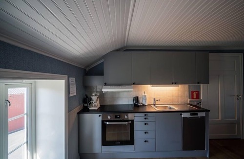 Sandoy Hotel | Unwind at Ona Havstuer - Guest Rated 9.6/10 with Dining