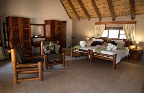 Kamanjab Cabin | Discover Ondundu Lodge: Rated 9.6/10 with Pool & Restaurant