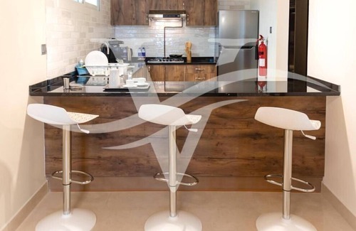 Sharjah Apartment | Cozy One Bedroom Apartment Steps from Ely Café