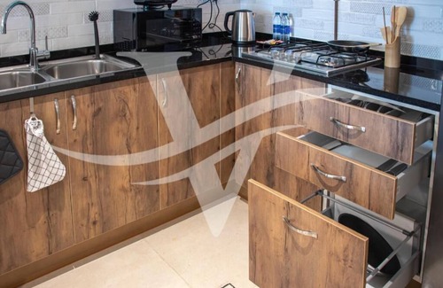 Sharjah Apartment | Cozy One Bedroom Apartment Steps from Ely Café