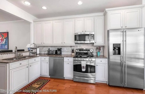 Fort Monmouth House | Oceanfront Bliss with Hot Tub, Just Steps from the Beach