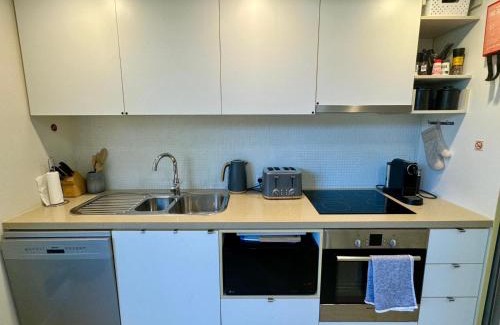 Nelly Bay Apartment | Discover Euodia Unit 1102: Oceanfront Retreat with Spa