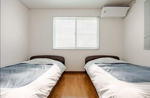 Shiraoi-cho House | Convenient Access to Upopoy from One House, Family-Friendly Stay