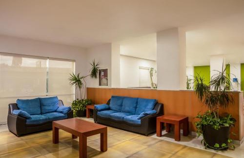 Cuautlancingo Hotel | Discover One Puebla FINSA: Family-Friendly with Breakfast