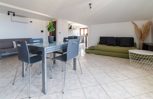 Ascea Apartment | Modern Loft Suite with Panoramic Views and Family Amenities