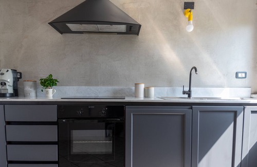 Ascea Apartment | Modern Loft Suite with Panoramic Views and Family Amenities
