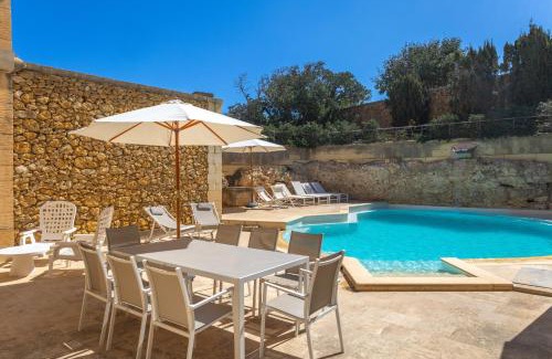 Xaghra House | Relax at OneFifty Holiday Home with Oceanfront Pool Access