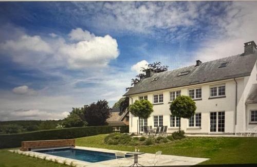 Theux House | Discover Oneux Village: Oceanfront Paradise with Pool Access