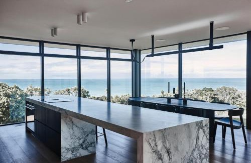 Okitu House | Explore ONYX HOUSE - Family-Friendly Retreat at Wainui Beach