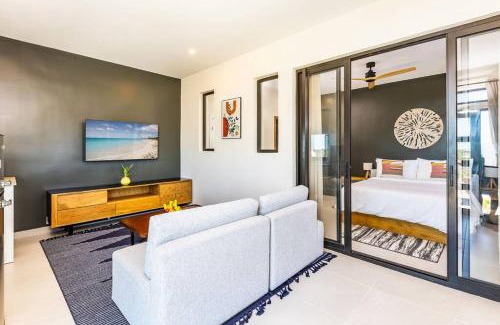 Long Bay Apartment | Discover Onyx I Long Bay Retreat: Poolside Paradise Near Beaches