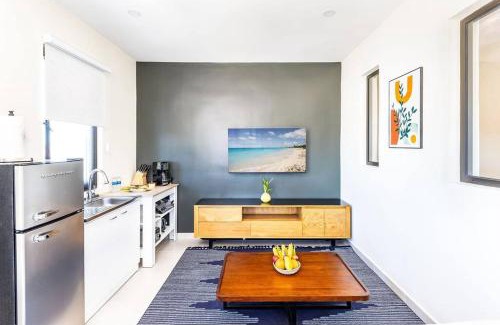 Long Bay Apartment | Discover Onyx I Long Bay Retreat: Poolside Paradise Near Beaches
