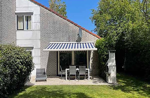 Julianadorp aan zee House | Discover Ooghduyne 76: Beachfront Oasis with Spa & Pool