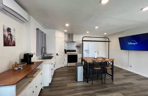 Santa Ana House | Modern Home Close to Disney with Spa & Family Amenities