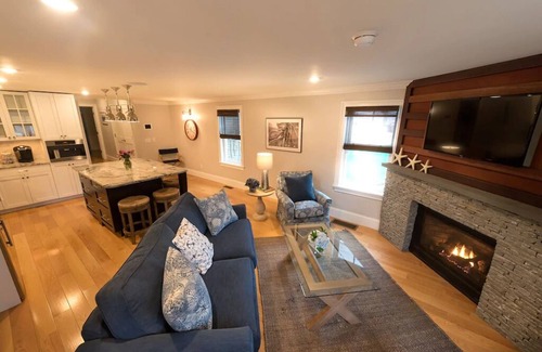 Yachting Village Condo | Inviting Open Concept Getaway with Fireplace Near Mansions
