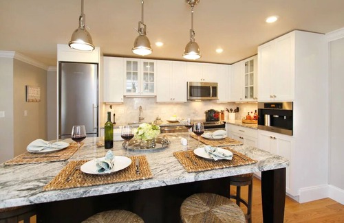 Yachting Village Condo | Inviting Open Concept Getaway with Fireplace Near Mansions