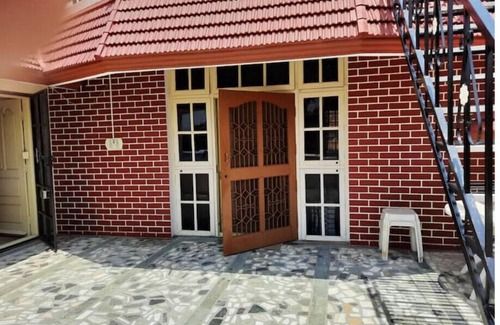 Mysore Apartment | Relax in a Serene Yard Surrounded by Mature Trees
