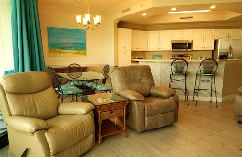 Orange Beach Condo | Book Your Stay: Free Boat Slip, Water Slide & Pools Await!