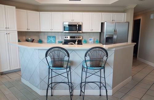 Orange Beach Condo | Book Your Stay: Free Boat Slip, Water Slide & Pools Await!