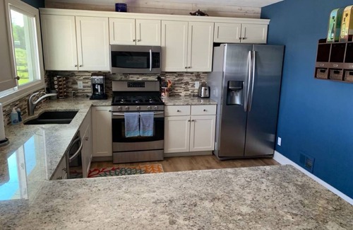 Ada House | Beautiful Big Crooked Lake House with Private Dock & Beach