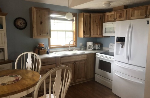 Rapid City Ski Chalet | Secluded Lake View Hotel with Hot Tub & 9.6/10 Rating
