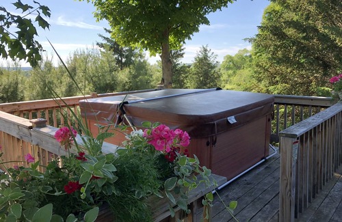 Rapid City Ski Chalet | Secluded Lake View Hotel with Hot Tub & 9.6/10 Rating