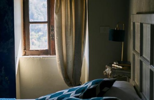 Calcata Historic Town House | Experience Opera Suites - Le notti bianche with Family-Friendly Amenities