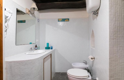 Calcata Historic Town House | Experience Opera Suites - Le notti bianche with Family-Friendly Amenities