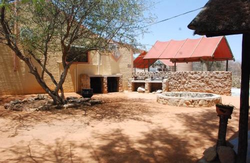 Kamanjab Cabin | Inviting Stay at Oppi-Koppi Rest Camp with Pool and Breakfast