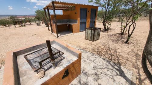 Opuwo Other | Opuwo Country Lodge Campsite: Poolside Retreat with Ocean View