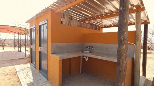 Opuwo Other | Opuwo Country Lodge Campsite: Poolside Retreat with Ocean View