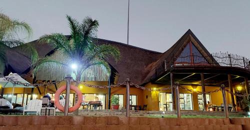 Opuwo Cabin | Relax at Opuwo Country Lodge with Ocean View Amenities