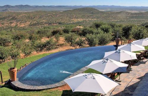 Opuwo Cabin | Relax at Opuwo Country Lodge with Ocean View Amenities