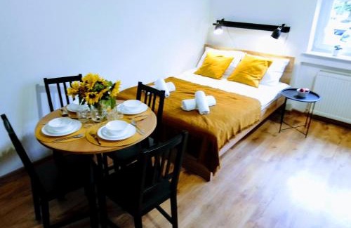 Wadowice Apartment | Child-Friendly Orange Apartment with Outstanding 9.2 Rating