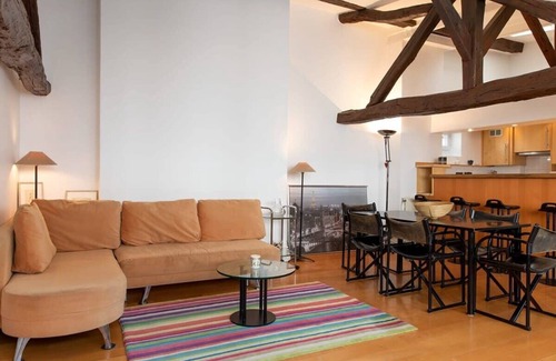 Quartier de la Place-Vendome Apartment | Bright Orange Vendome 1-Bedroom Near the Louvre