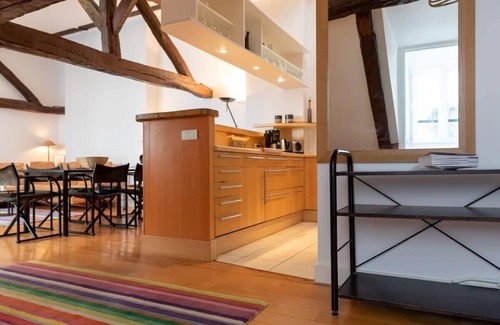 Quartier de la Place-Vendome Apartment | Bright Orange Vendome 1-Bedroom Near the Louvre