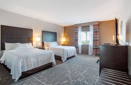 Waldron Hotel | Discover Orangewood Inn & Suites at Kansas City Airport