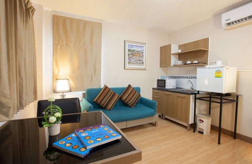 San Sai Apartment | Inviting Orawan Suites: Top-Rated Stay with Breakfast & Kitchen