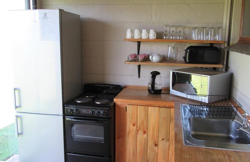 Cathkin Park Apartment | Orchard Manor Unit 2: Relax by the Pool, Enjoy Breakfast