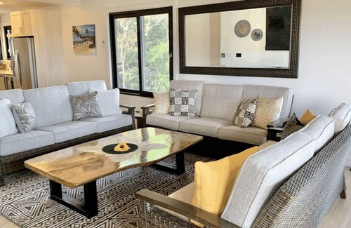 Brick Bay Villa | Experience the Orchid Penthouse at Curacion Beach Resort
