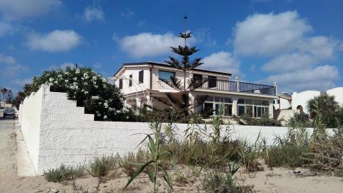 Granelli House | Discover Oceanfront Bliss at Orchidea Superattico
