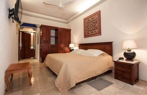 Acapantzingo Hotel | Discover Orchidelirium Casa Hotel: Spa, Pool & Family-Friendly