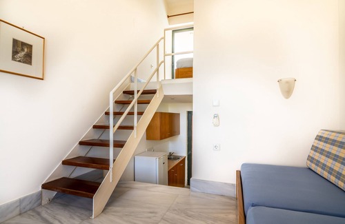 Stalos Apartment | Tranquil Orestis Studio: Oceanfront Stay with Pool & Kitchen
